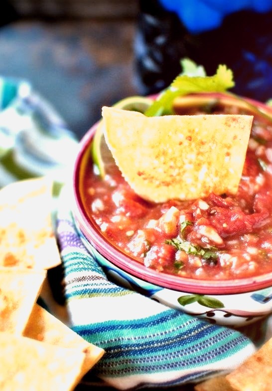 Roasted tomato salsa with baked tortilla chips. Yum!